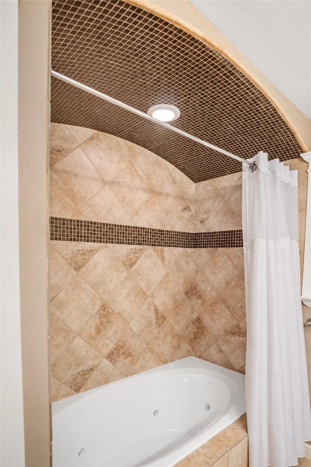 bathroom featuring a combined bath / shower with jetted tub