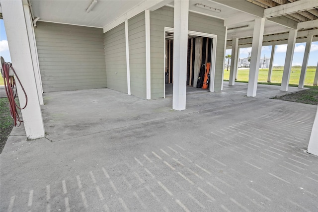 view of patio / terrace featuring a garage