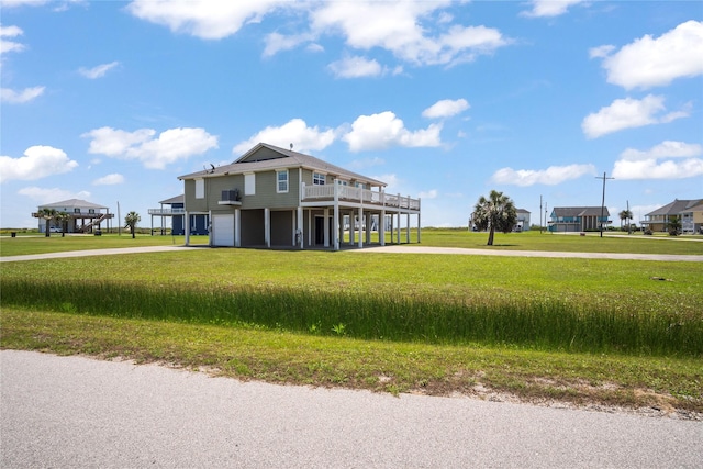 surrounding community featuring a carport, a yard, driveway, and a deck