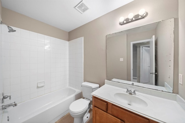 bathroom featuring vanity, shower / bathing tub combination, toilet, and visible vents