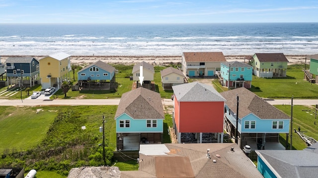 birds eye view of property with a residential view and a water view