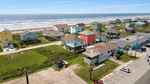 birds eye view of property featuring a water view and a residential view