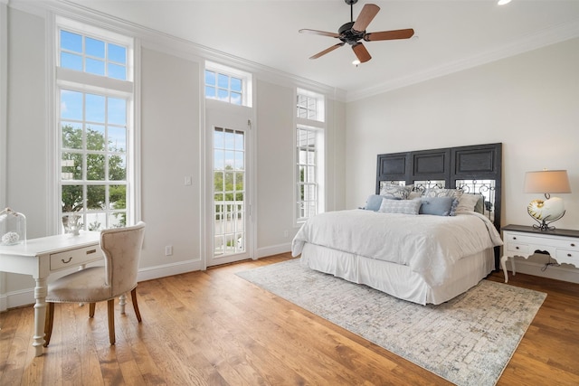 bedroom with ornamental molding, access to exterior, baseboards, ceiling fan, and light wood finished floors