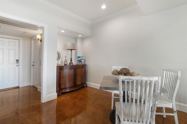 dining room featuring recessed lighting, baseboards, and concrete floors