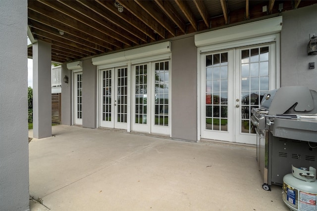 view of patio / terrace featuring french doors and a grill