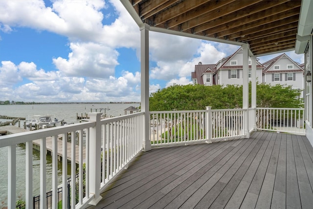 wooden deck with a water view