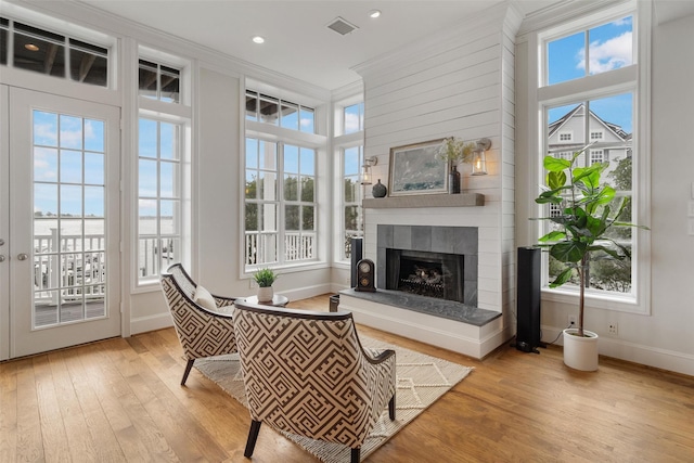 sunroom / solarium with visible vents and plenty of natural light