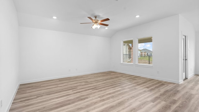spare room with recessed lighting, ceiling fan, light wood-type flooring, and lofted ceiling