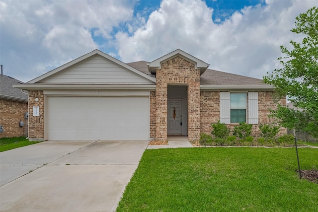 single story home featuring a garage, driveway, a front lawn, and brick siding