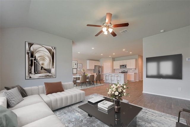 22907 Tuscany Ridge Ln, Katy, TX 77449 - living area with light wood-style floors, ceiling fan, baseboards, and recessed lighting