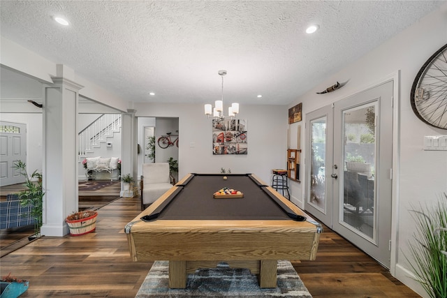playroom with dark wood-style floors, recessed lighting, a textured ceiling, french doors, and billiards