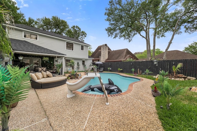 view of pool featuring a fenced in pool, a fenced backyard, and a patio area
