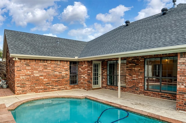 outdoor pool featuring a patio area