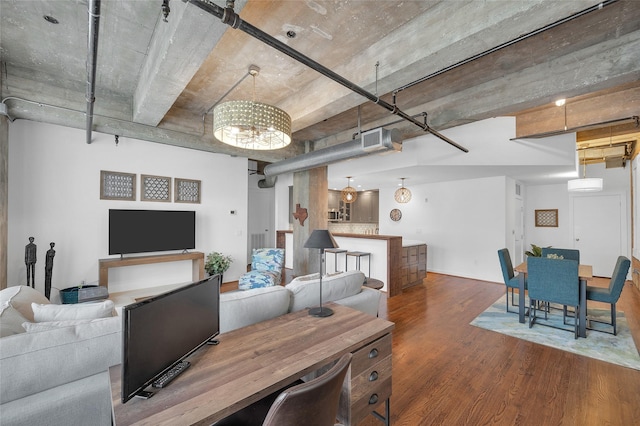 204 Travis St Unit 4A, Houston, TX 77002 - living area with visible vents, wood finished floors, and a notable chandelier
