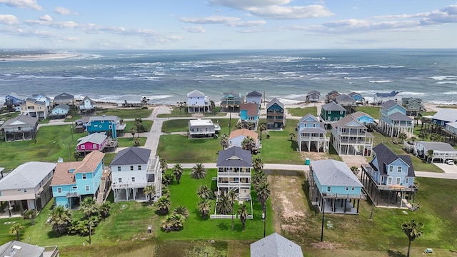 birds eye view of property featuring a water view and a residential view