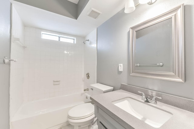 full bath with visible vents, shower / bath combination, toilet, and vanity