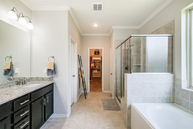 full bath with a walk in closet, vanity, ornamental molding, a bath, and a stall shower