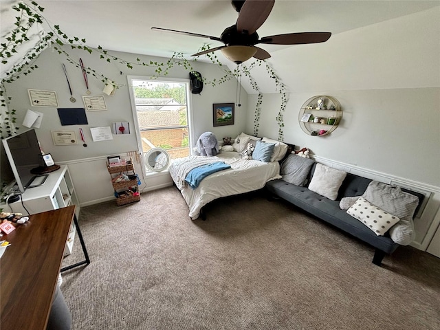bedroom featuring carpet flooring, a ceiling fan, and vaulted ceiling