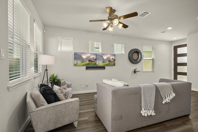 9904 Smokehouse Silo Ln, Houston, TX 77080 - living area featuring wood finished floors, baseboards, a ceiling fan, and recessed lighting