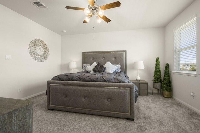 9904 Smokehouse Silo Ln, Houston, TX 77080 - carpeted bedroom with baseboards and ceiling fan
