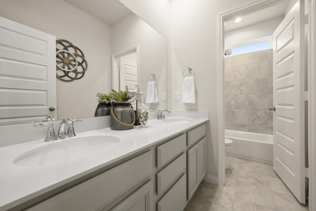 9904 Smokehouse Silo Ln, Houston, TX 77080 - full bath with toilet, double vanity, and bathing tub / shower combination