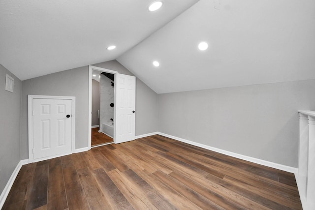 bonus room with recessed lighting, baseboards, wood finished floors, lofted ceiling, and visible vents