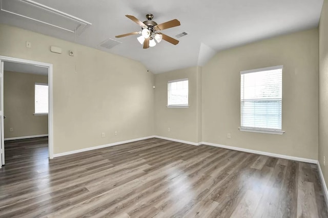 6315 Bain Dr, Missouri City, TX 77459 - empty room featuring attic access, a ceiling fan, baseboards, wood finished floors, and visible vents