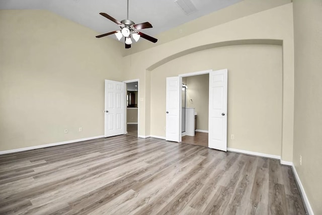 6315 Bain Dr, Missouri City, TX 77459 - unfurnished bedroom with baseboards, wood finished floors, vaulted ceiling, and visible vents
