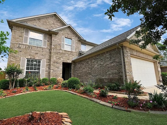 6315 Bain Dr, Missouri City, TX 77459 - view of front of house featuring an attached garage, a front yard, and brick siding
