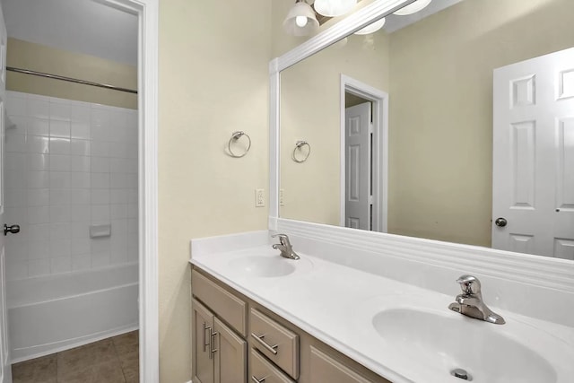 6315 Bain Dr, Missouri City, TX 77459 - full bathroom with double vanity, a sink, tile patterned flooring, and bathtub / shower combination