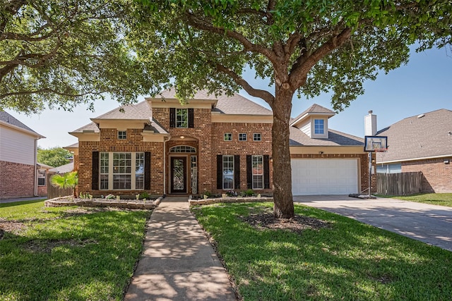 26210 Seminole Hill Ln, Katy, TX 77494 - traditional home with brick siding, a garage, concrete driveway, and roof with shingles