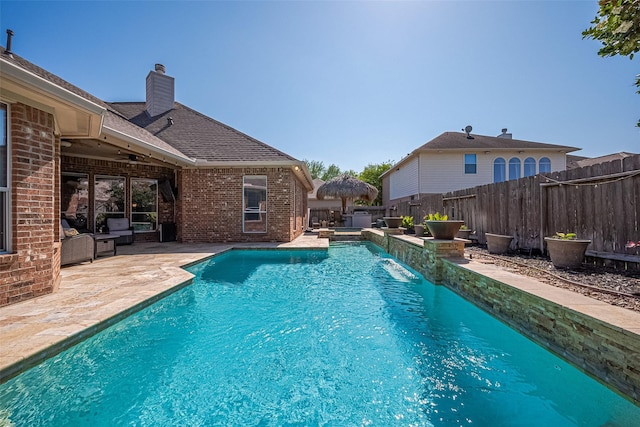 26210 Seminole Hill Ln, Katy, TX 77494 - view of pool with a patio area, a ceiling fan, and a fenced backyard