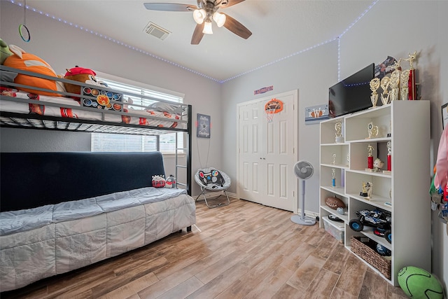 26210 Seminole Hill Ln, Katy, TX 77494 - bedroom featuring wood finished floors and a ceiling fan