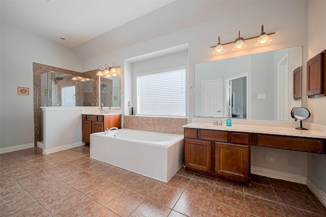 26210 Seminole Hill Ln, Katy, TX 77494 - full bath featuring a stall shower, plenty of natural light, a garden tub, two vanities, and lofted ceiling