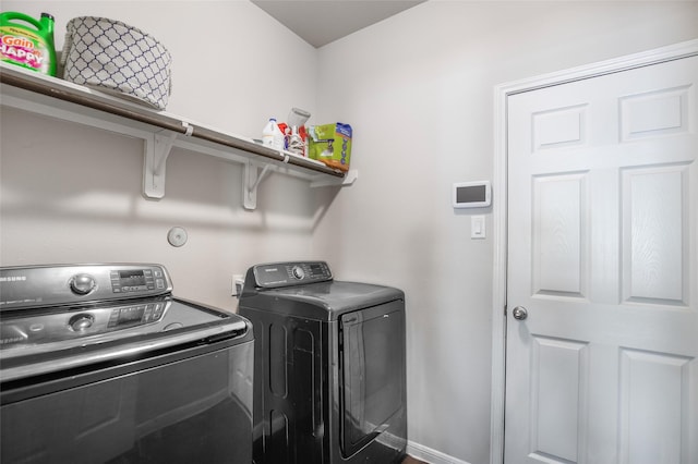 laundry area featuring independent washer and dryer and laundry area