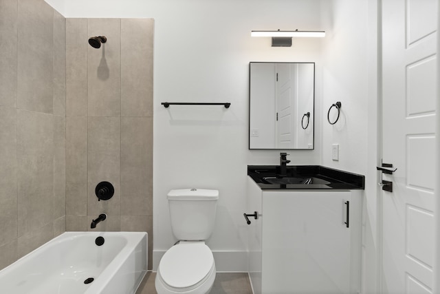 full bath featuring toilet, baseboards, shower / bathing tub combination, and vanity