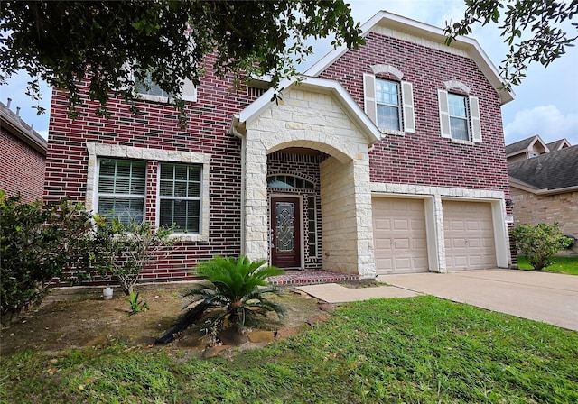 traditional-style home with brick siding, an attached garage, driveway, and stone siding