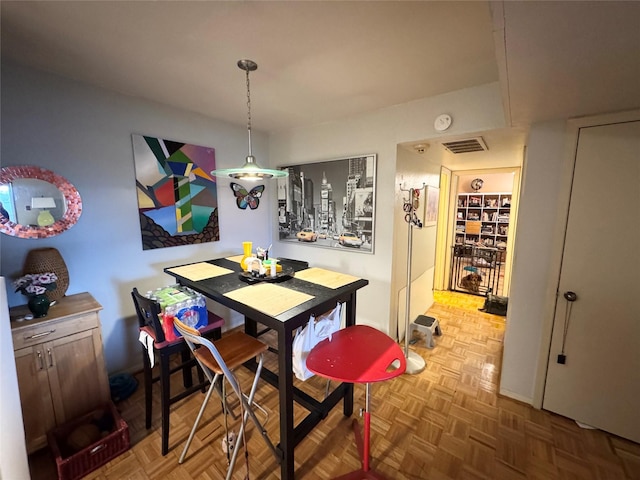 dining room with visible vents