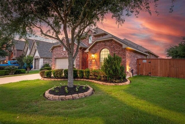 17014 Wellinghoff Ct, Richmond, TX 77407 - view of front of property featuring brick siding, a garage, a shingled roof, and concrete driveway