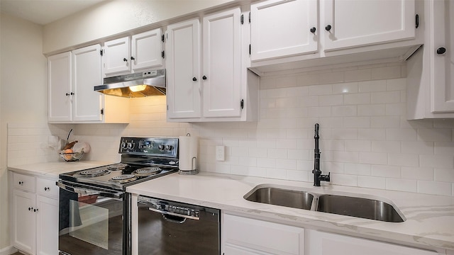 kitchen featuring a sink, white cabinetry, under cabinet range hood, and black appliances