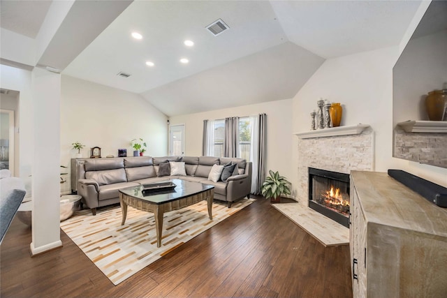 15334 Forest Creek Farms Dr, Cypress, TX 77429 - living room featuring vaulted ceiling, a fireplace, recessed lighting, and dark wood-type flooring