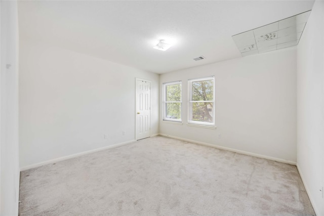 15334 Forest Creek Farms Dr, Cypress, TX 77429 - carpeted spare room featuring attic access and baseboards