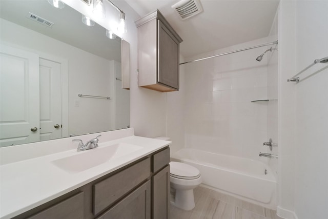 1642 Portia Ln, Conroe, TX 77301 - bathroom featuring vanity, toilet,  shower combination, and visible vents