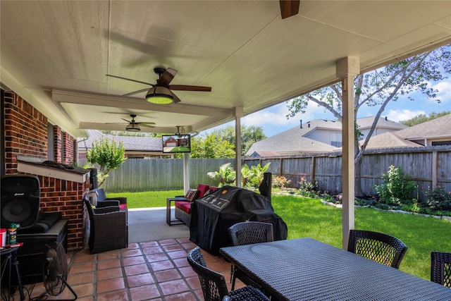 view of patio / terrace with outdoor dining space, a ceiling fan, a fenced backyard, and grilling area