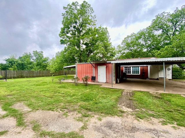 view of outdoor structure with fence