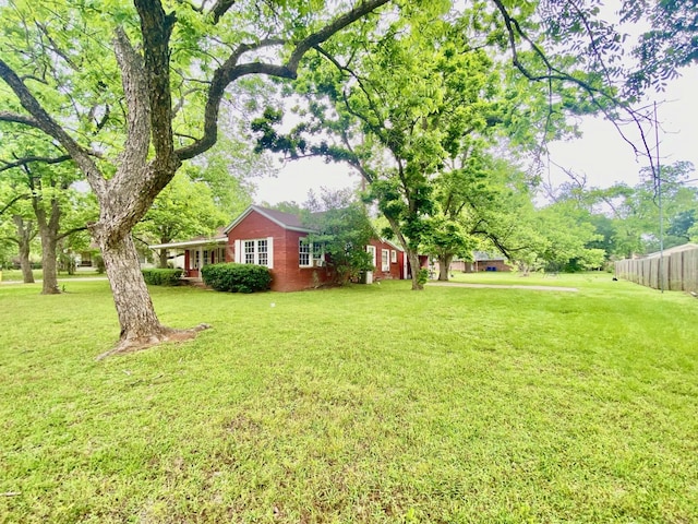 view of yard with fence