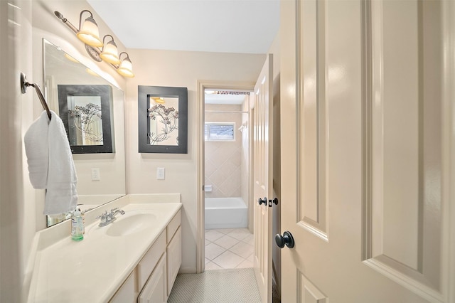 full bath featuring vanity, shower / bath combination, and tile patterned floors
