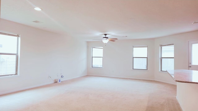 2702 Urban Glen Ct, Houston, TX 77038 - spare room with light carpet, baseboards, a ceiling fan, and recessed lighting