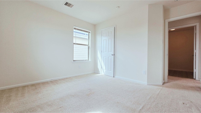 2702 Urban Glen Ct, Houston, TX 77038 - unfurnished bedroom with carpet floors, baseboards, and a closet