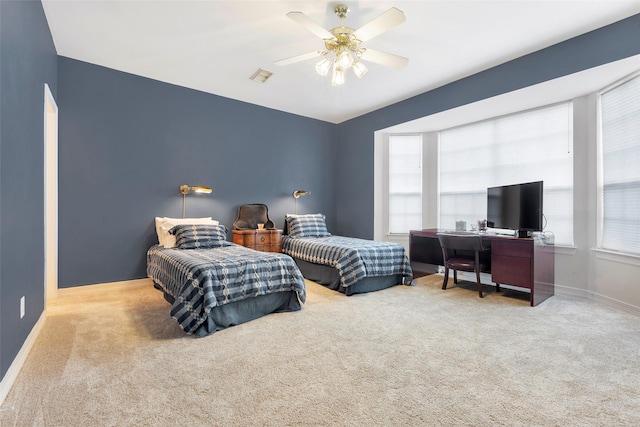 1202 Joe Annie St, Houston, TX 77019 - carpeted bedroom featuring visible vents, baseboards, and ceiling fan